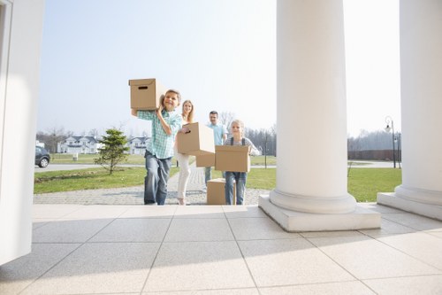 Commercial office move in Fulham with boxes, furniture, and IT equipment