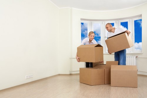 Office relocation equipment and desks prepared for transport in Fulham