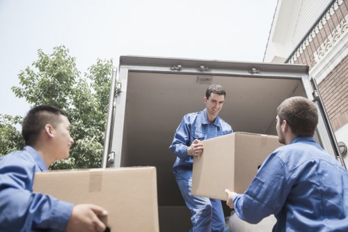 Office relocation setup with boxes and equipment in Fulham