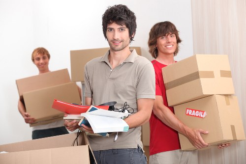 Packed moving boxes inside a Fulham removal van