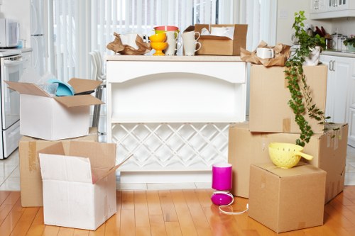Removal team loading furniture into a moving van in Fulham