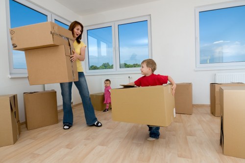 Piano being loaded securely into a transport vehicle for delivery
