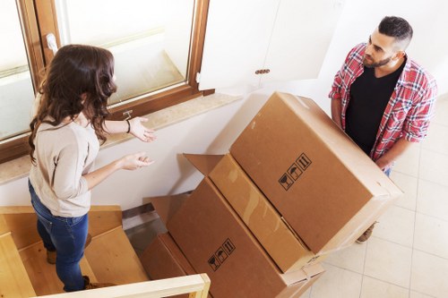 Furniture being loaded into a removal van in Fulham