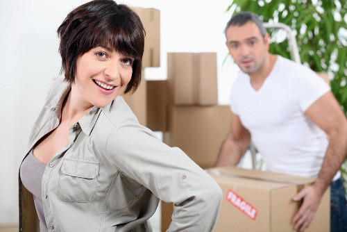 Worker assessing a moving job and handling risks