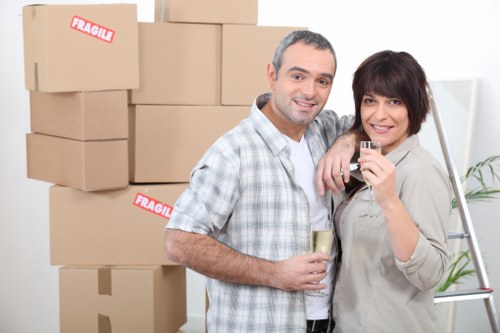 Business office movers in Fulham packing desks and equipment for relocation